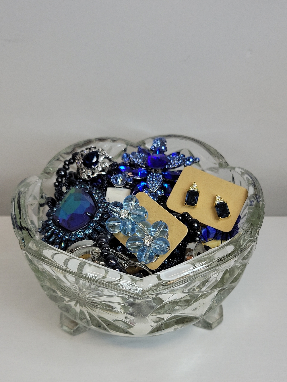 Glass Dish Filled With Jewelry